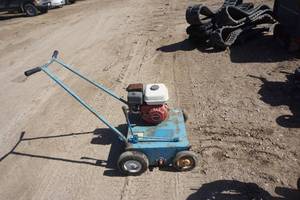 lot 32 image: Walk Behind Power Lawn Dethatcher
