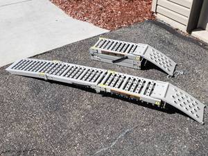 lot 44 image: (2) Aluminum  Folding Trailer Ramps by Larin