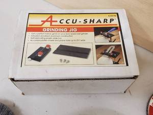 lot 67 image: Grinding Wheel with Accu Sharp Grinding Jig with misc Accessories for a Grinder