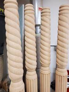 lot 86 image: (4) 76 Tall Wooden Posts