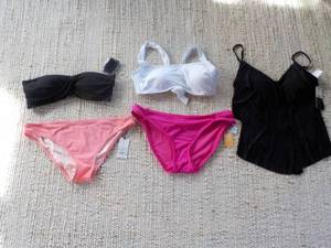 2 swimsuit bottoms size L and 3 swi...