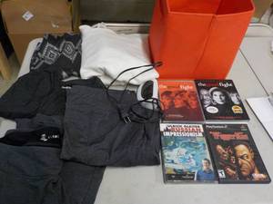 DVDs and game, alarm clock, clothe...