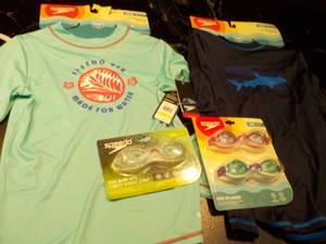Speedo size Jr. M swim tees and gog...