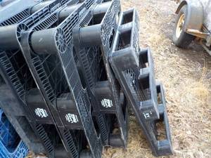 4 plastic pallets...