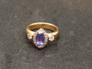 lot 106 image: 14k Gold Ring with Purple Stone