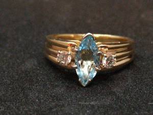 lot 102 image: 14k Gold Ring with Light Blue Stone