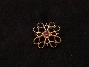 lot 133 image: 10k Gold Pin with Red Stone