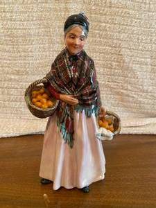 lot 211 image: Royal Doulton The Orange Lady Figurine