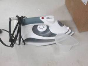 1200 watt steam iron powers on ...