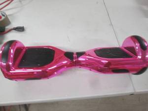 pink hoverboard powers on...