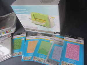 lot 28 image: Cricut Cuttlebug