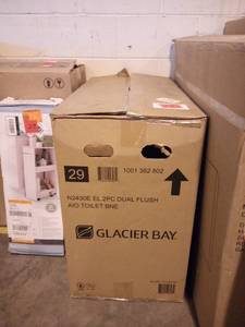 lot 24 image: 2-piece 1.0 GPF1.28 GPF High Efficiency Dual Flush Elongated Toilet in Bone by Glacier Bay