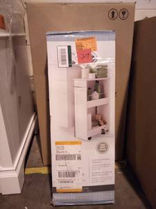 lot 27 image: Slimline 16 in. W Rolling Floor Wood Storage Shelf in White by Zenna Home