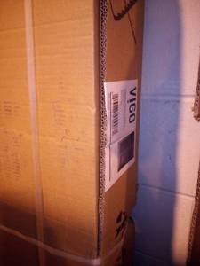 lot 64 image: Elan 56 to 60 in. x 74 in. Frameless Sliding Shower Door in Stainless Steel with Clear Glass and Handle by VIGO