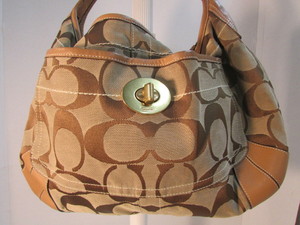 lot 76 image: Authentic Coach Signature Crown Soho  Satchel