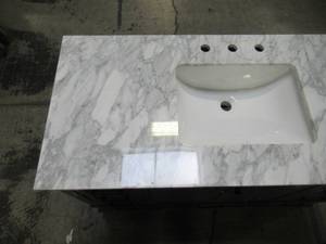 lot 218 image: Home Decorators Collection Merryfield 49 in. W x 22 in. D Bath Vanity in Dark Blue-Gray with Marble Vanity Top in Carrara White with White Basin 19112-VS49-DG