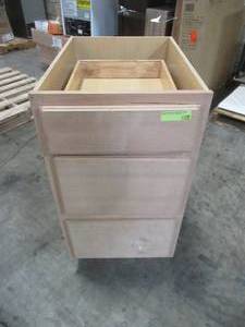 lot 300 image: Hampton Bay Assembled 18x34.5x24 in. Base Kitchen Cabinet with 3 Drawers in Unfinished Beech KDB18-UFDF