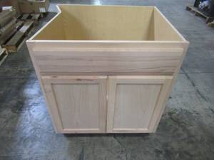 lot 303 image: Hampton Bay Assembled 30x34.5x24 in. Sink Base Cabinet in Unfinished Beech KSB30-UF