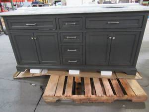 lot 101 image: Home Decorators Collection Windlowe 73 in. W x 22 in. D x 35 in. H Bath Vanity in Gray with Carrara Marble Vanity Top in White with White Sinks - Some Slight Scratches, Small Chips on Top.