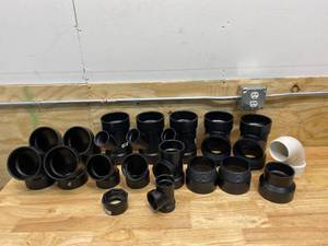 lot 89 image: Lot of 18 Various PVC Pipe Fittings