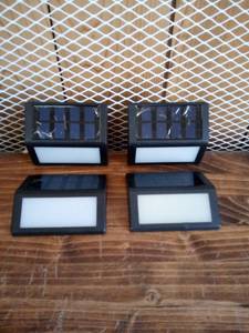 lot 10 image: Solar Black LED Stair Light 10 Lumens (4-Pack) by Hampton Bay