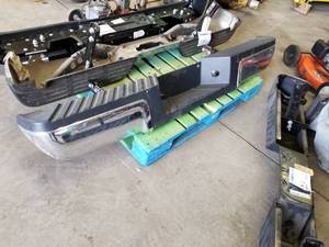 lot 224 image: Ford Chrome Pickup Truck Rear Bumper with Rubber Step Guard