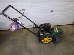 lot 4 image: Yardman 5 HP 22 String Trimmer with Line