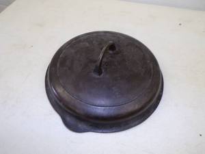 lot 53 image: Griswald Cast Iron Cover