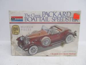 lot 88 image: Vintage Monogram Packard Boat Tail Speedster