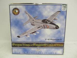lot 14 image: New In Box Heritage Mint F-4J Phantom II Wooden Model