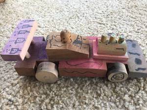 lot 234 image: Wooden Pull Toys In Wooden Basket