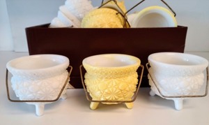 lot 44 image: Yellow And White Handled Candleholders