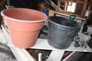 Lot of (2) Garden Accessories - Plant Pots (x2), Water Can (x2), Sprayer, (x1), Hose Sprayers, Misc. Garden Accessories  with Watering Cans