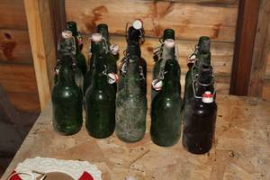 Lot of (15) Decorative Glass Bottles with Toppers