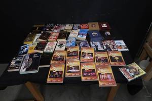 ASSORTED LOT OF DVDS AND BOOKS
