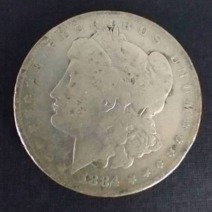 lot 379 image: 1884-O Morgan Dollar