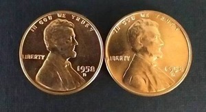 lot 382 image: 2 Uncirculated 1958-D Wheat Pennies