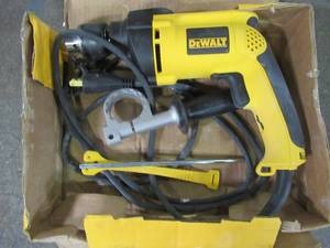 lot 20 image: DEWALT 12 in. Variable Speed Reversible Hammer Drill, DW511 - Used.