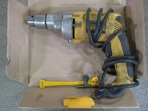 lot 25 image: Dewalt 7.8 Amp 12 in. Variable Speed Reversing Drill, DW235G - USED - Missing Handle.