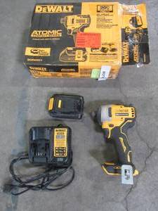 lot 28 image: Dewalt ATOMIC 20-Volt MAX Cordless Brushless Compact 14 in. Impact Driver, (1) 20-Volt Battery & Charger, DCF809C1 - Used.