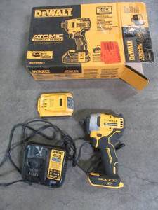 lot 29 image: Dewalt ATOMIC 20-Volt MAX Cordless Brushless Compact 14 in. Impact Driver, (1) 20-Volt Battery & Charger, DCF809C1 - Used.