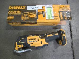 lot 31 image: DEWALT ATOMIC 20-Volt MAX Cordless Brushless Oscillating Multi-Tool (Tool-Only), DCS354B. - Used.