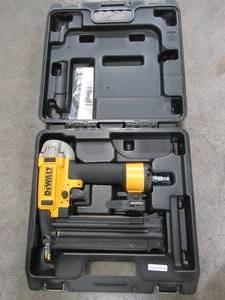 lot 36 image: DEWALT 18-Gauge Pneumatic Brad Nailer, DWFP12233 - Used.