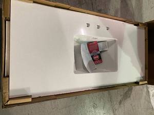 Home Decorators 49 in. W x 22 in. D Engineered Marble Vanity Top in Snowstorm with White Single Trough Sink not used