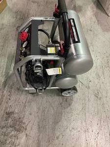 Husky 4.5 Gal Silent Air Compressor  in good condition