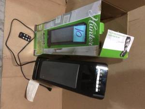 lot 10 image: 24 in. 1500-Watt Digital Ceramic Tower Heater with Remote Control by Hunter Customer retturns See Pictures