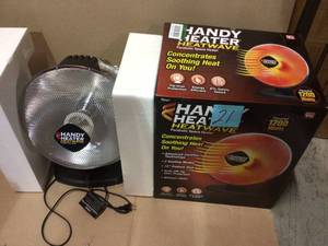 lot 21 image: 800-Watt Electric Ceramic Parabolic Space Heater by GreenMade Customer retturns See Pictures