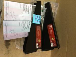lot 33 image: Slat Wall and Track Shelf Bracket by Husky Customer retturns See Pictures