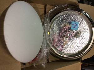 lot 49 image: Centra 3-Light Brushed Stainless Flush Mount by Sea Gull Lighting Customer retturns See Pictures