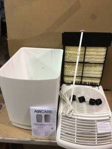 lot 63 image: 6-Gal. Evaporative Humidifier for 2700 sq. ft. by AIRCARE Customer retturns See Pictures